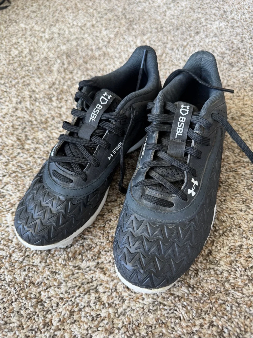 Under Armour Black Cleats with White Soles